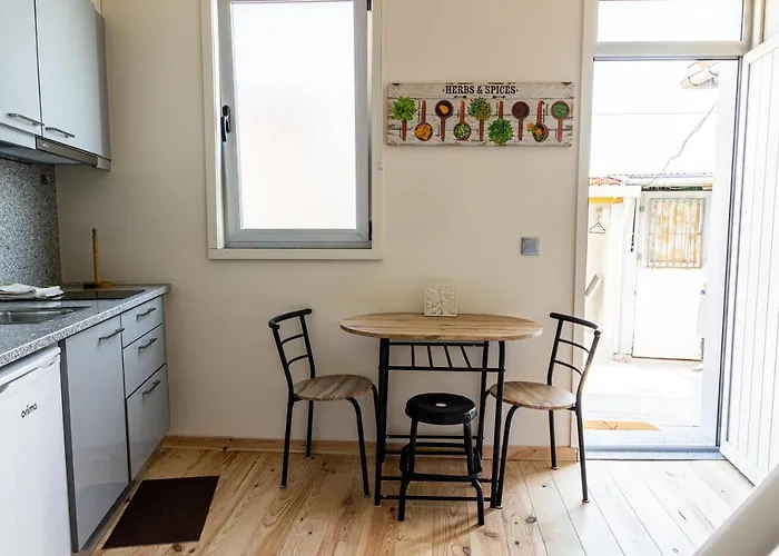 House On A Rustic Island At Campanha Trainstation Oporto